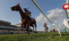 Corach Rambler with Derek Fox pass the winning post to win the Grand National in 2023