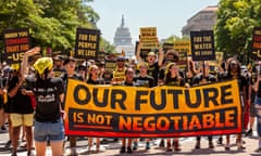 Protest demanding climate action and jobs, Pennsylvania Avenue NW, Washington, USA - 28 Jun 2021<br>Mandatory Credit: Photo by Allison Bailey/REX/Shutterstock (12173478e) Hundreds of protesters march down Pennsylvania Avenue, en route to the White House. Protesters are young adults who are members of the Sunrise Movement. They have 3 demands of the Biden Administration: no compromises on climate with Congressional Republicans, a meeting with Sunrise Movement, and the creation of a Civilian Conservation Corps. Protest demanding climate action and jobs, Pennsylvania Avenue NW, Washington, USA - 28 Jun 2021