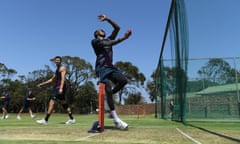 Jofra Archer bowls in the nets as Mark Wood looks on at St George’s Park in Port Elizabeth