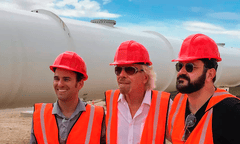 Richard Branson pictured in front of the Hyperloop One technology