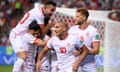 Wahbi Khazri, second right, celebrates with teammates after scoring Tunisia’s second goal.