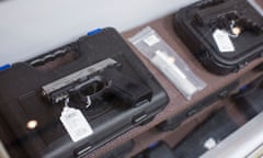 Black handguns on display