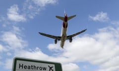 A plane comes into land at Heathrow airport in London. 