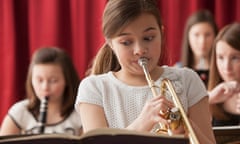 Girl playing a trumpet