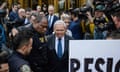 Bob Menendez leaves court in New York City on 27 September. 