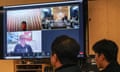Members of the Korean Football Association technical committee attend a meeting, with Jürgen Klinsmann, who attended via a video link from his home in the US