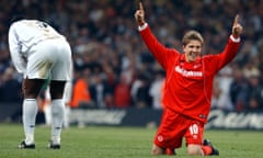 Bolton Wanderer's Bruno N'Gotty, left, bends over in dejection as Middlesbrough's Juninho celebrates his teams 2-1 victory in the League Cup final held at the Millennium Stadium in Cardiff, Wales Sunday Feb. 29,. (AP Photo/Richard Lewis) ** INTERNET OUT, ONLINE OUT **