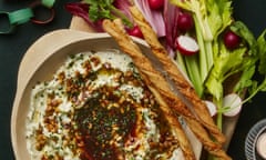 Yotam Ottolenghi's three-cheese dip with spiced date syrup and pine nuts and parmesan grissini for dipping.