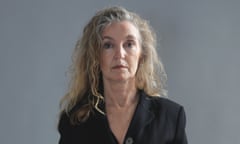 Head shot of writer Rebecca Solnit, against grey background, photographed in 2017