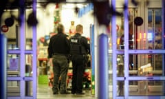 Police respond to the scene of a shooting on Monday, Nov. 20, 2023 in Beavercreek, Ohio. Police say a shooter opened fire at a Walmart, wounding four people before apparently killing himself. The attack took place Monday night at a Walmart in Beavercreek, in the Dayton metropolitan area. (Marshall Gorby/Dayton Daily News via AP)