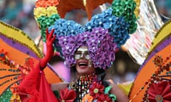 A participant celebrates the Gay and Lesbian Mardi Gras Parade in Sydney<br>A participant celebrates the Sydney Gay and Lesbian Mardi Gras Parade under coronavirus disease (COVID-19) safety guidelines at the Sydney Cricket Ground in Sydney, Australia, March 6, 2021.  REUTERS/Loren Elliott