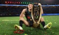 Nathan Cleary gets his hands on the Provan-Summons trophy once again after Penrith beat Brisbane in a classic NRL grand final in Sydney.