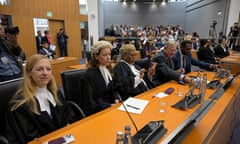 A row of lawyers in a courtroom