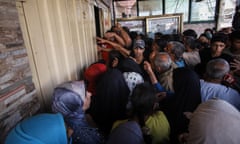 People crowded outside shop