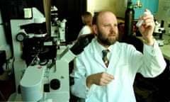 Dr Ian Wilmut the scientist leading the team that successfully cloned Dolly the sheep prepares for another cloning carried out at the Roslin Institute yesterday. Edinburgh. PHOTO MURDO MACLEOD Tel: +44 131 6699659