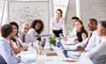 Posed by models Asian Businesswoman Leading Meeting At Boardroom Table