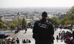 A gendarme patrols in the Montmartre district Friday, April 21, 2017 in Paris. The shooting at the Champs Elysees rattled France only two days before the end of an unusually suspenseful election contest. (AP Photo/Kamil Zihnioglu)