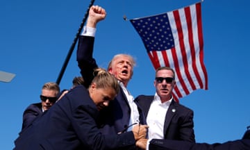 Republican presidential candidate former President Donald Trump is surrounded by US Secret Service agents at a campaign rally in Pennsylvania. 