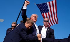 Republican presidential candidate former President Donald Trump is surrounded by U.S. Secret Service agents at a campaign rally, Saturday, July 13, 2024, in Butler, Pa. (AP Photo/Evan Vucci)