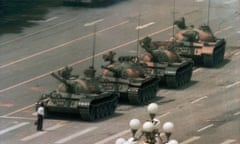 FILE - In this June 5, 1989, file photo, a man stands alone in front of a line of tanks heading east on Beijing's Changan Blvd. in Tiananmen Square, Beijing. Hong Kong’s second ban on an annual vigil for victims of the bloody June 4, 1989, crackdown on Beijing’s Tiananmen Square protest movement and the closure of a museum dedicated to the event may be a further sign that the ruling Communist Party is extending its efforts to erase the event from the collective consciousness from the mainland to Hong Kong. (AP Photo/Jeff Widener, File)