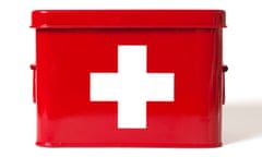 Red first aid kit with white cross