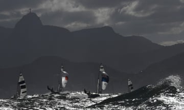 Competitors sail in the 470 Women sailing class on Guanabara Bay in Rio de Janerio.