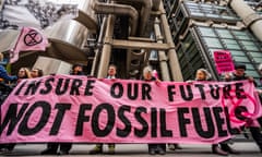 Protesters link arms outside Lloyds of London on Wednesday.