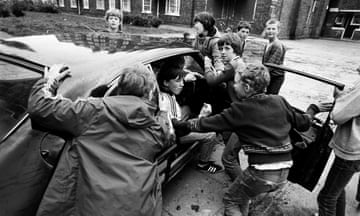 Children with abandoned / stolen car, Everton, Liverpool 1981<br>Children with abandoned / stolen car. Tommy White Gardens Everton, Liverpool 1981