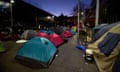 Tents belonging to homeless people are seen at dawn in Martin Place, Sydney.