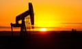 An oil well silhouetted in North Dakota