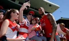 Sydney star Lance Franklin poses for photographs with fans in the lead-up to the Swans’ AFL grand final appearance against the Western Bulldogs.