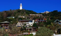 Cape Byron lighthouse above Wategos Beach houses