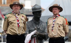 Rover Scouts Chris Arthur (left) and Matthew Trott with the statue of Robert Baden-Powell on Poole Quay in Dorset.