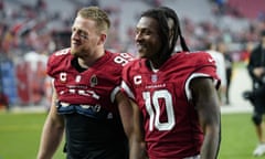 DeAndre Hopkins (right) with his Cardinals teammate JJ Watt after a game last season