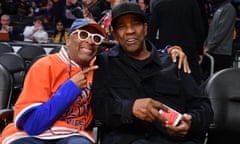 Celebrities At The Los Angeles Lakers Game<br>LOS ANGELES, CALIFORNIA - MARCH 12: Spike Lee (L) and Denzel Washington attend a basketball game between the Los Angeles Lakers and the New York Knicks at Crypto.com Arena on March 12, 2023 in Los Angeles, California. (Photo by Allen Berezovsky/Getty Images)