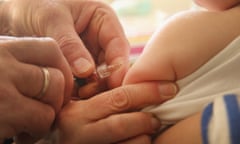 Baby receives vaccine