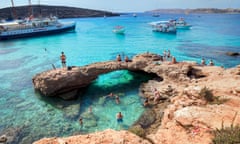 Swimmers and sunbathers at the Blue Lagoon, Comino, Gozo