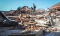 Indonesian rescuers search for victims under the ruin of a collapsed house after an earthquake struck in North Lombok, West Nusa Tenggara, Indonesia.