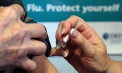 A patient receives the seasonal flu vaccine