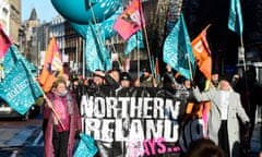 Striking workers march towards Belfast city hall on 18 January.