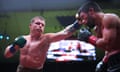 Canelo Álvarez, left, lands a left hand against John Ryder on Saturday night.