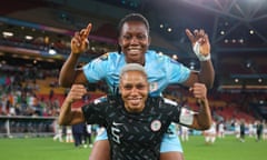 Nigeria’s Onome Ebi and Chiamaka Nnadozie (top) celebrate after reaching the last 16 of the World Cup.