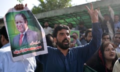 Nawaz Sharif supporters celebrate outside the high court in Islamabad.