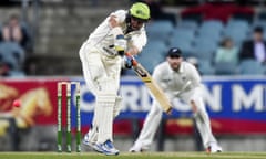 Spot the ball: former Australia batsman Mike Hussey works the pink ball away during Friday’s Prime Minister’s XI game at Manuka Oval.