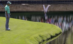 Sergio Gárcia survey the water at the 15th, where he lost five balls en route to a record-breaking 13 and a total of 81. Jordan Spieth leads after a six-under 66.