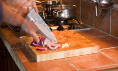 Chopping onions for supper using a big knife