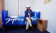 A Sydney 2000 Olympic Games official in one of the bedrooms in the Athlete’s Olympic Village for the 2000 Sydney Olympic Games in Homebush, Sydney, Australia.