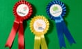 The three main UK political parties rosettes.