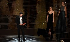 ‘I’ve said all I need to say’ … Brie Larson, second from right, watches Casey Affleck accept the best actor Oscars at this year’s ceremony.