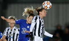 Chelsea's Erin Cuthbert is beaten in the air by Juventus' Cristiana Girelli.